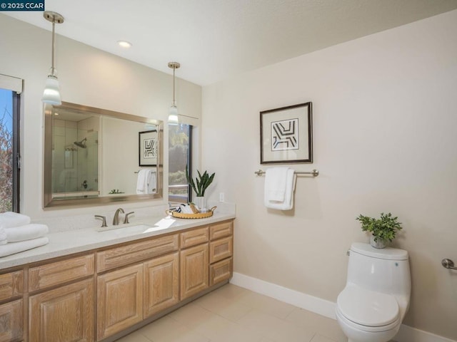 bathroom featuring vanity, tile patterned flooring, a shower with door, and toilet