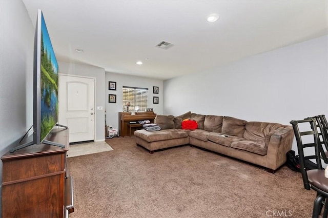 living room featuring carpet