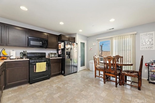 kitchen with dark brown cabinets and black appliances