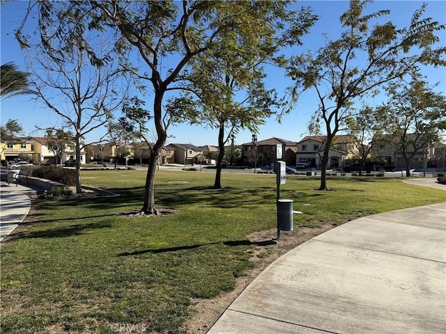 view of home's community featuring a yard