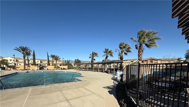 view of pool featuring a patio area and a pergola