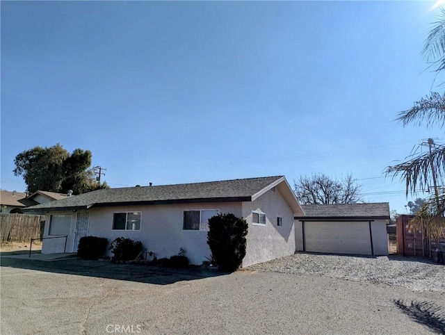 view of side of property with a garage