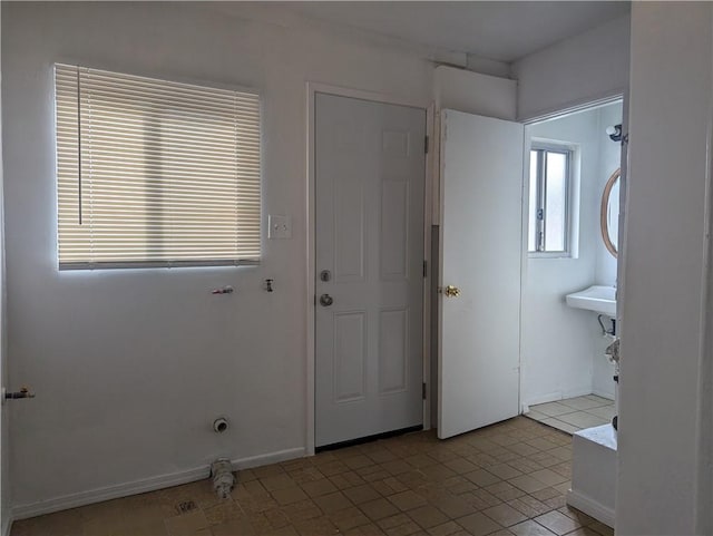 interior space with light tile patterned floors