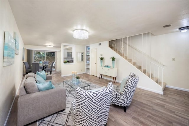 living room with wood-type flooring