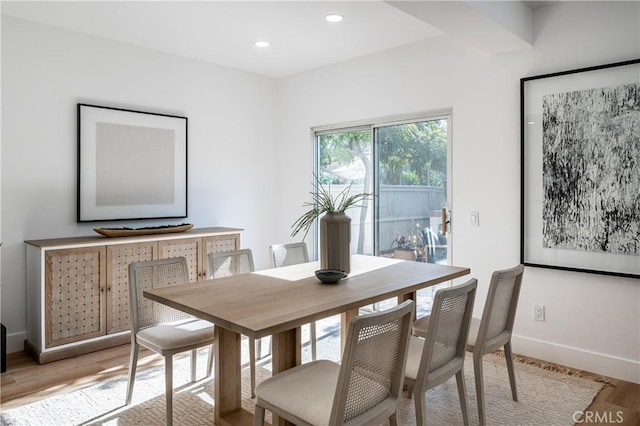 dining area with light hardwood / wood-style flooring