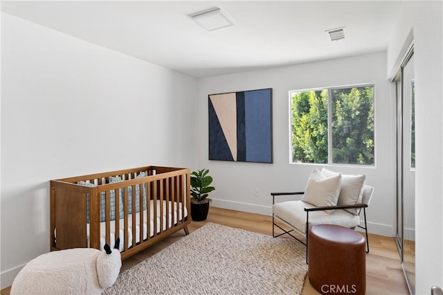 bedroom featuring light hardwood / wood-style flooring