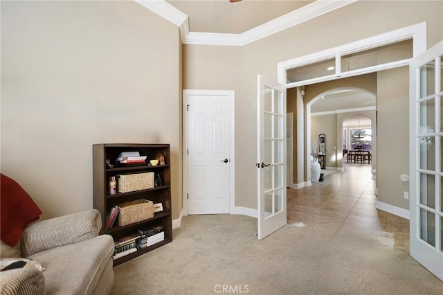 3600 Laver Ct, Redding, CA 96002 - sitting room with french doors, ornamental molding, arched walkways, carpet flooring, and baseboards