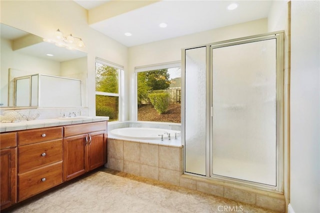 3600 Laver Ct, Redding, CA 96002 - bathroom featuring a shower stall, a bath, double vanity, tile patterned flooring, and recessed lighting