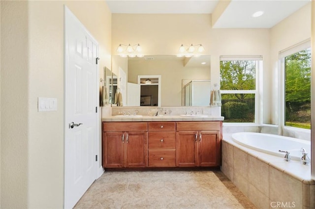 3600 Laver Ct, Redding, CA 96002 - full bathroom featuring a bath, a shower stall, and double vanity