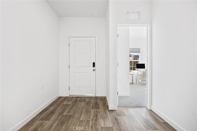 hall featuring hardwood / wood-style flooring