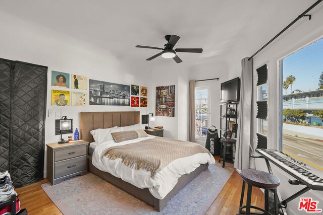 bedroom featuring ceiling fan and light hardwood / wood-style floors