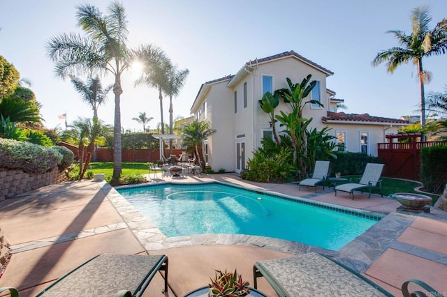 view of swimming pool with a patio area and a pergola