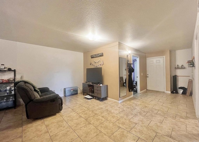 living room with a textured ceiling