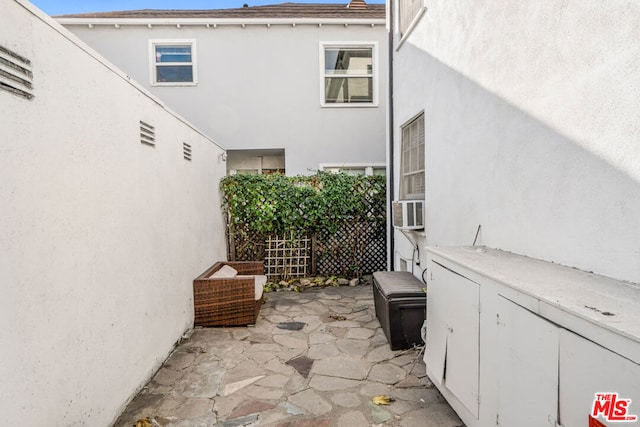 view of patio with cooling unit