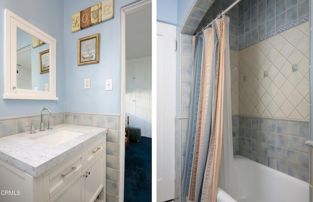 bathroom with vanity and shower / bath combo with shower curtain