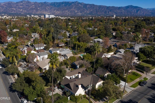 birds eye view of property featuring a mountain view