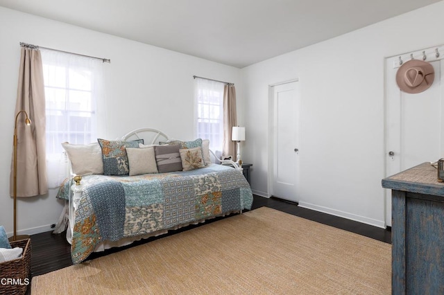 bedroom featuring dark hardwood / wood-style floors