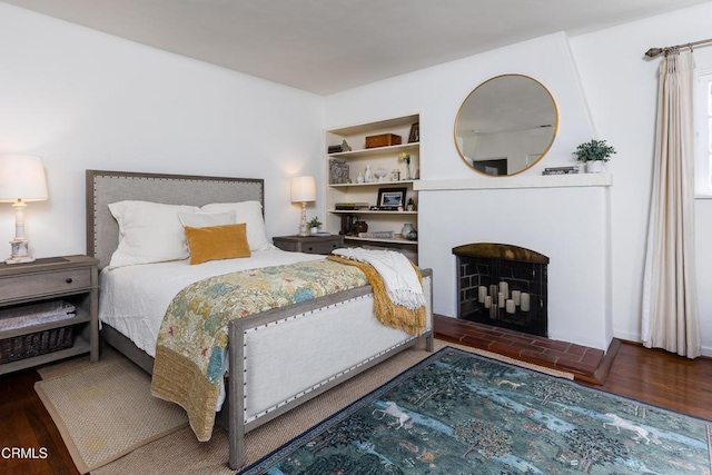 bedroom featuring dark hardwood / wood-style floors