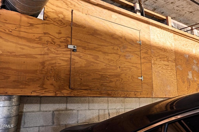 interior details featuring concrete block wall