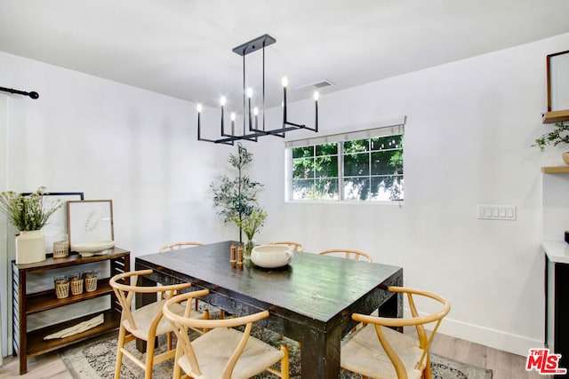 dining room featuring light hardwood / wood-style floors