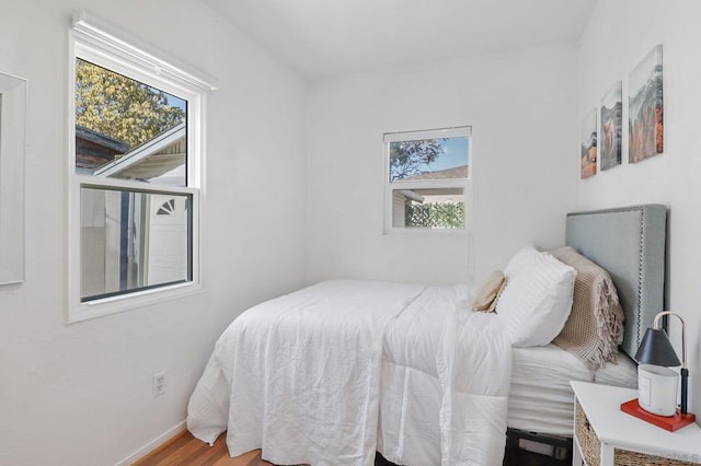 bedroom featuring hardwood / wood-style floors