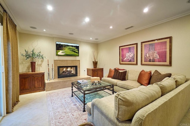 living room with a fireplace, light tile patterned flooring, and ornamental molding