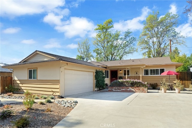 ranch-style home with a garage