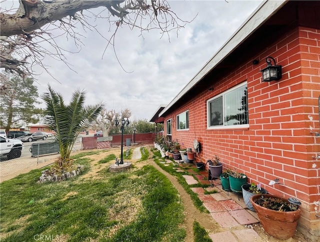 view of yard with fence