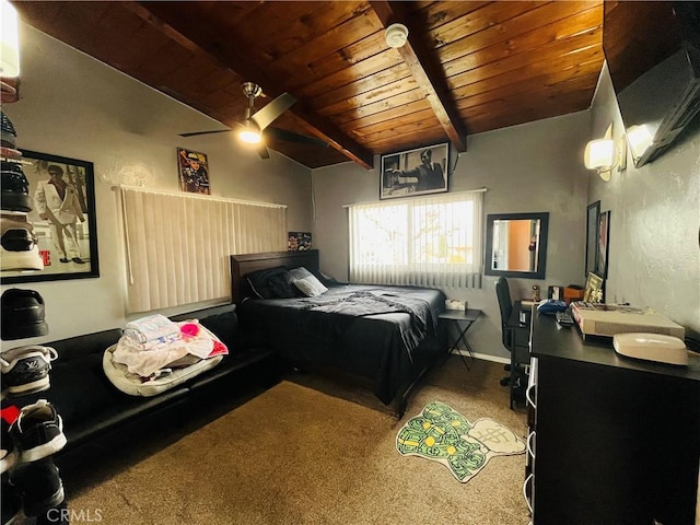 carpeted bedroom with wooden ceiling, vaulted ceiling with beams, baseboards, and ceiling fan