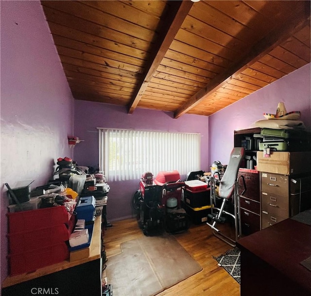 home office featuring wood ceiling, vaulted ceiling with beams, and wood finished floors