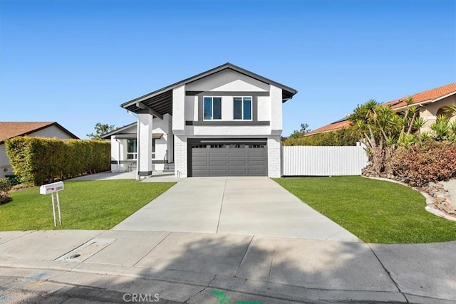 view of front facade featuring a garage and a front yard