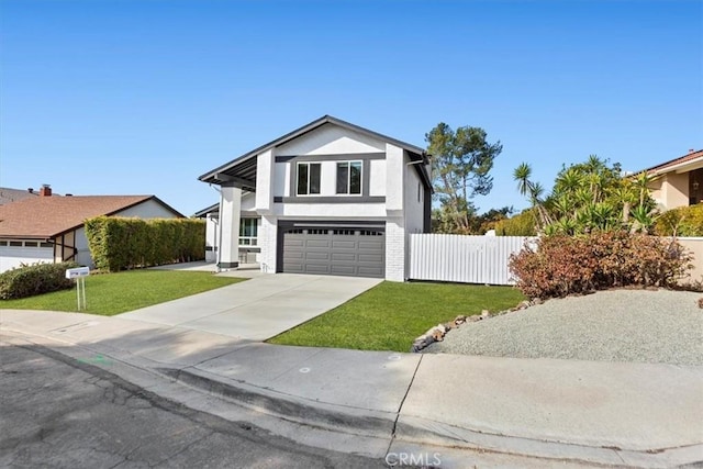 view of front of property with a front lawn and a garage