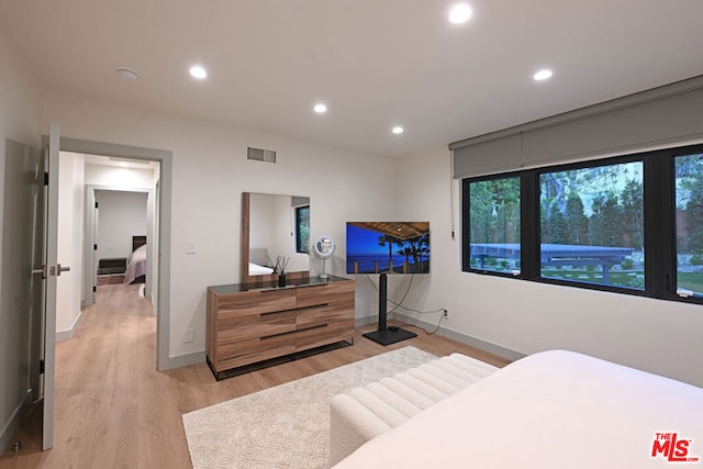 bedroom with light wood-type flooring