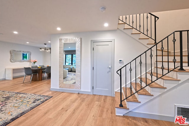 entrance foyer with light hardwood / wood-style floors