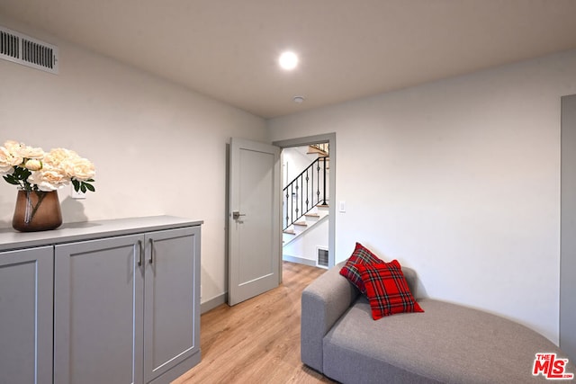 sitting room featuring light hardwood / wood-style floors