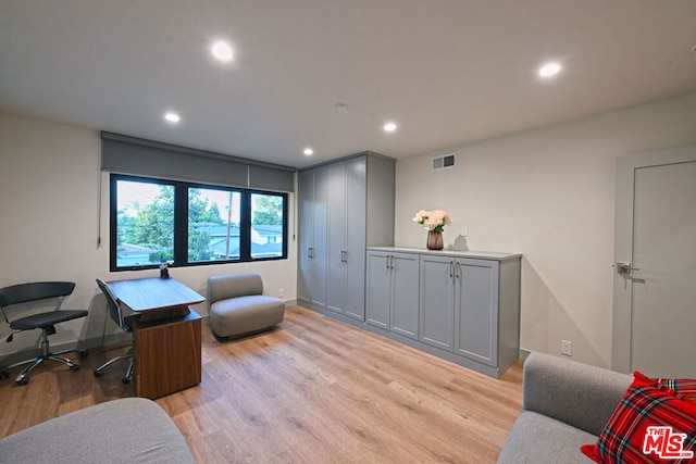 home office with light wood-type flooring