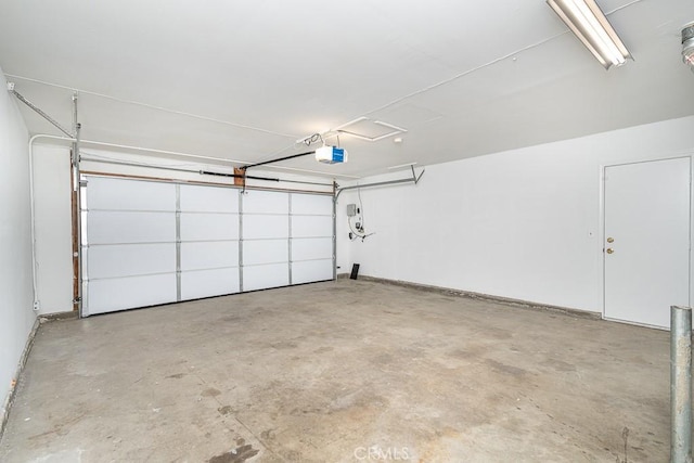 garage featuring a garage door opener