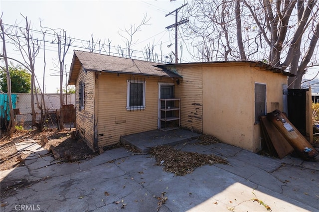 back of property featuring a patio area