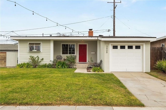 ranch-style home with a garage and a front yard