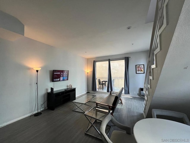 living room featuring dark hardwood / wood-style floors