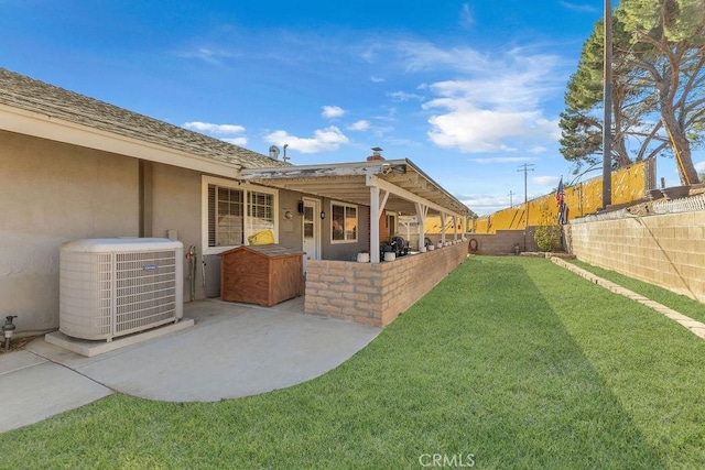 view of yard featuring a patio area and cooling unit