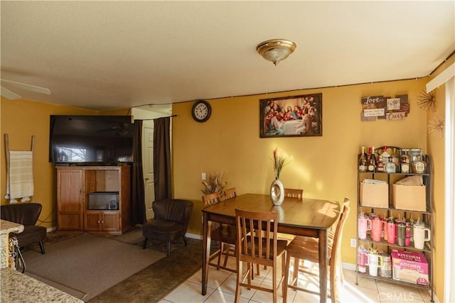 view of tiled dining space