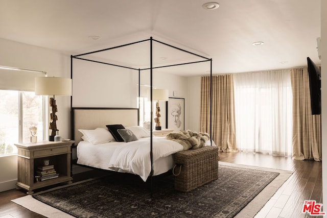 bedroom featuring dark hardwood / wood-style floors