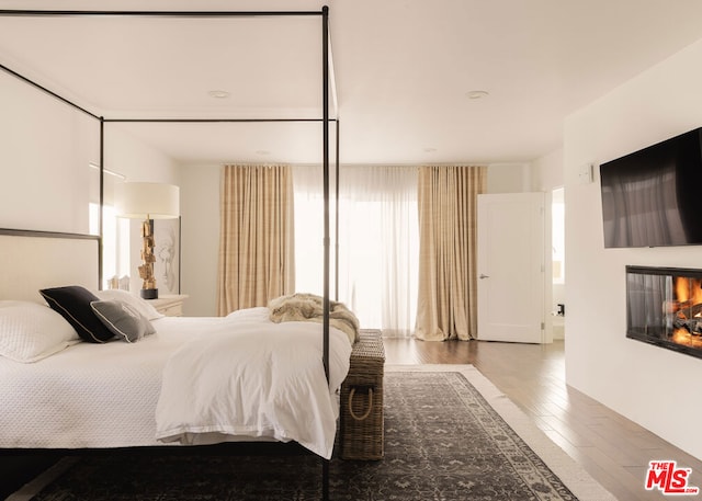 bedroom featuring hardwood / wood-style flooring