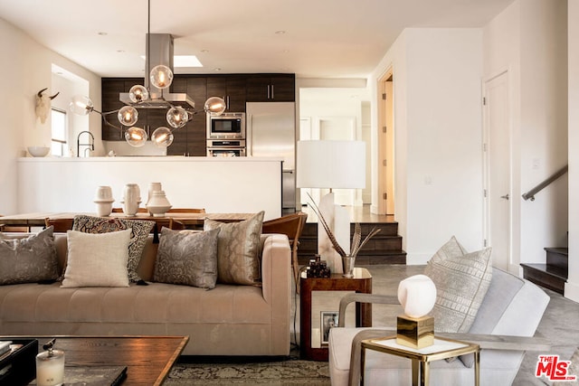 living room with a chandelier