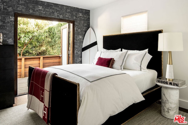 bedroom featuring hardwood / wood-style flooring