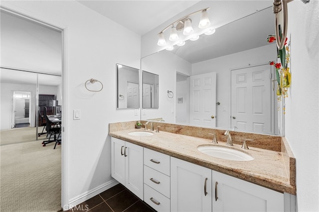 bathroom featuring vanity and tile patterned flooring