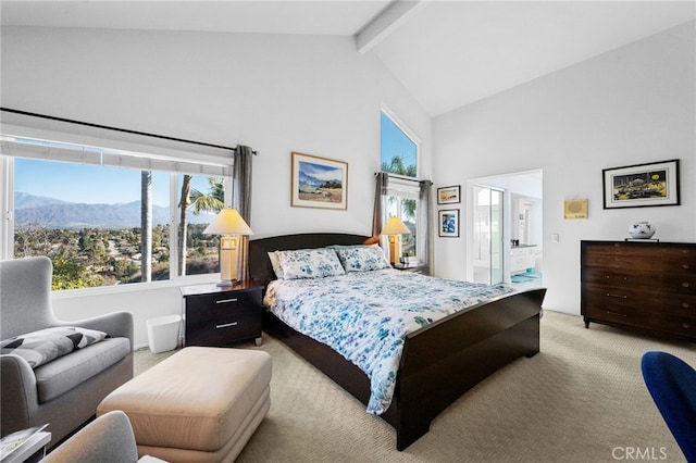 carpeted bedroom with a mountain view, high vaulted ceiling, and beam ceiling