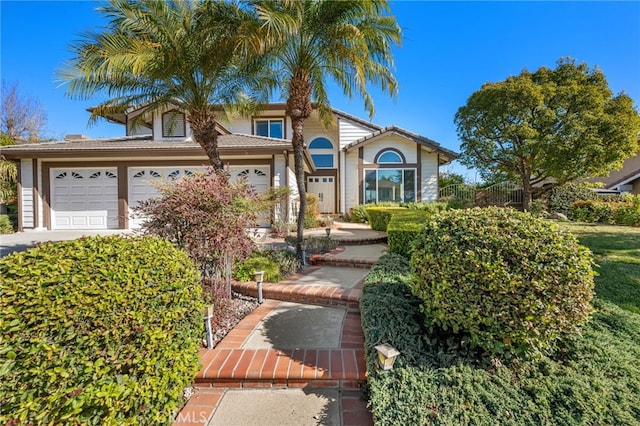 view of front of property featuring a garage