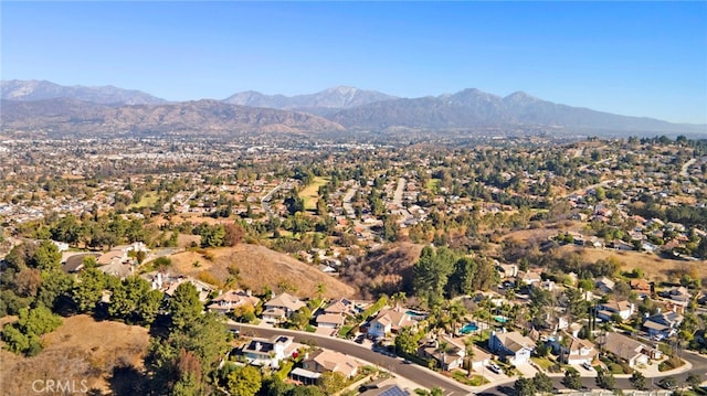 drone / aerial view featuring a mountain view